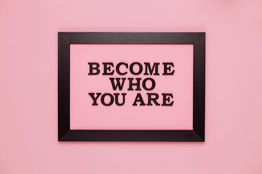Discover Your Soul's Desires Through Your Higher Self Discover your soul's desires - Inspiring quote 'Become Who You Are' framed on a vibrant pink wall, perfect for encouragement.